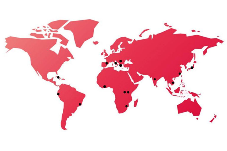 red stylized map of the world with points representing OVPDEI Overseas' trips.